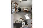 Gut vermietete 1,5-Zimmer-DG-Wohnung mit Garage in Kiel-Wellsee