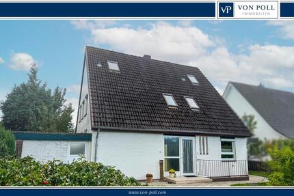 Erdgeschosswohnung in ruhigem Zweifamilienhaus mit überdachter Terrasse & Carport 4 zimmer