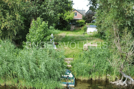 Wohnen am Wasser - Charmantes Einfamilienhaus mit Seezugang und Privatsteg!